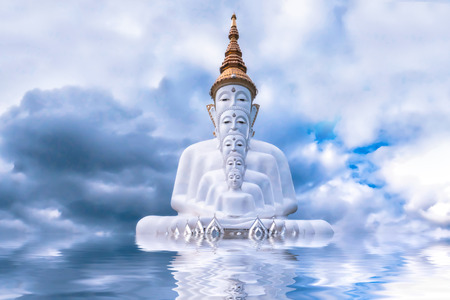 Five Buddha statue on blue sky and water reflection backgroundの写真素材