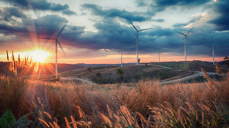 Beautiful landscape wind turbine field at sunset (oil paint)