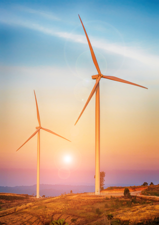 Wind turbine at sunriseの写真素材
