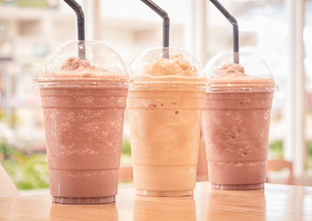 Chocolate Frappe and Frappuccino on wood tableの写真素材