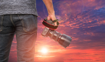 Photographer at sunset