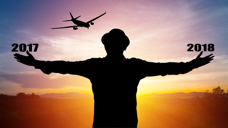 Happy man in successful business airline 2017 to 2018 new year,business conceptの写真素材
