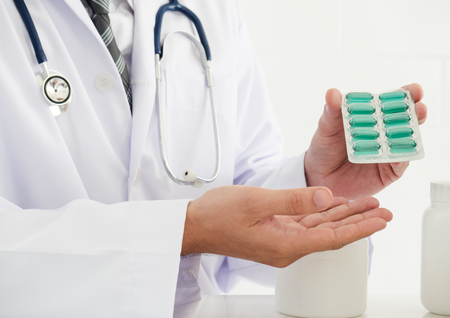 The doctor explained about the medication to the patient. Healty and medical concept.の写真素材