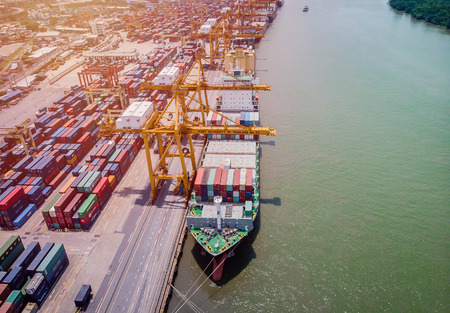 Aerial view panorama from drone. Ship in import/export business and logistics. Shipping and cargo to harbor by crane. Water transport International.Business logistics concept.のeditorial素材
