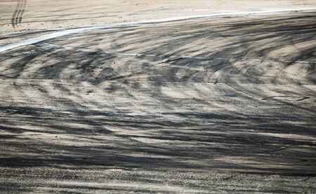 Tire marks on roads, asphalt and rubber scraps from drift tiresの写真素材