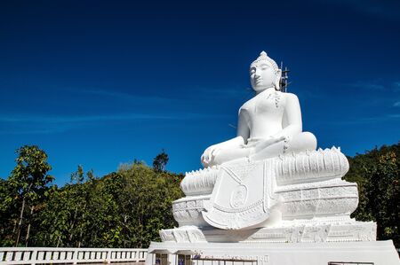 white Buddha statue under construction in Chiangmai,  Thailandの写真素材