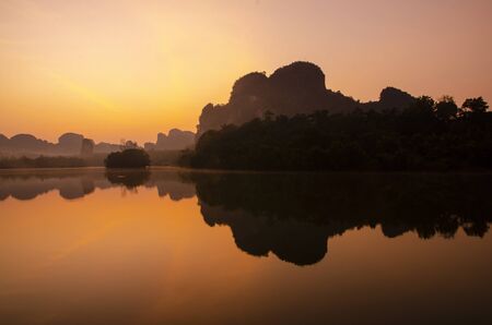 Amazing view of dramatic sunrise over Nong Tale Lake in Krabi, Thailandの写真素材