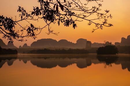 Amazing view of dramatic sunrise over Nong Tale Lake in Krabi, Thailandの写真素材