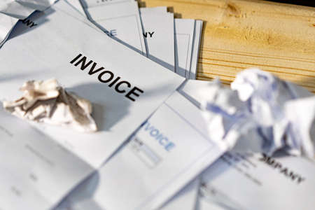 The invoice on the tableの写真素材