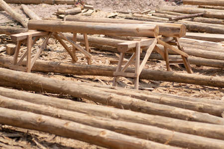 Large stack of wood planks, teak woodの写真素材