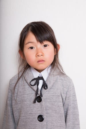 Young Japanese student ready to go to schoolの写真素材