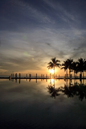 pool and beach taking while sunset in the morning の写真素材