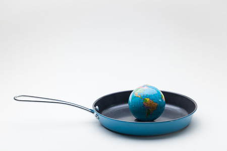 conceptual image of global warming on fried panの写真素材