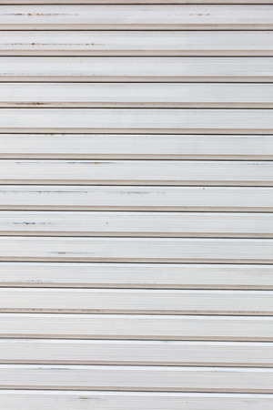 background image of white steel shutterの写真素材