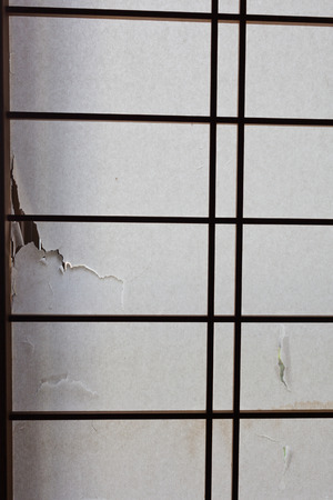 broken japanese style paper windowの写真素材