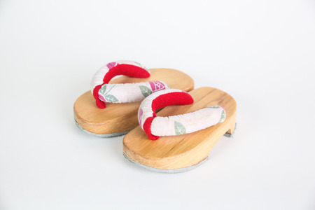 traditional japanese slipper(geta) on white backgroundの写真素材