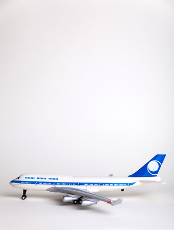 side view of toy aircraft on white backgroundの写真素材