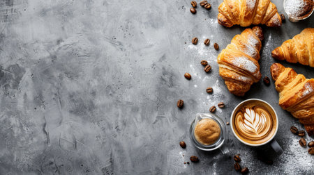 Enjoy a cozy moment with freshly baked croissants paired with rich coffee. This image captures the warm tones and inviting textures, perfect for food lovers.の素材