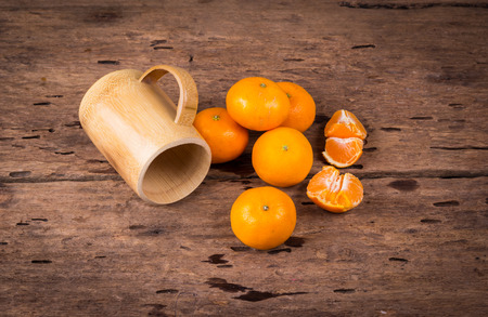 Orange on a wooden floor.の写真素材