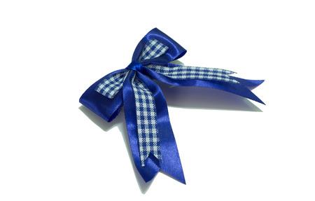 Blue ribbon with bow on a white backgroundの写真素材
