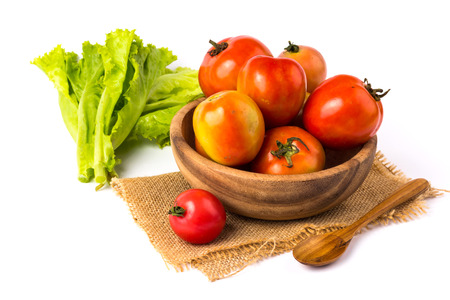 vegetable in wooden bowl on a white backgroundの写真素材