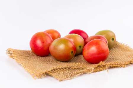 cherry tomatoes on a white background.の写真素材