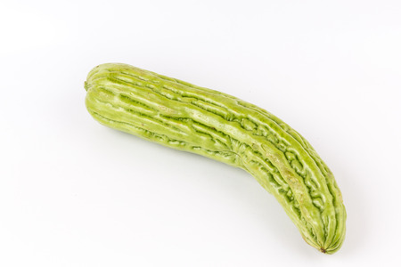 Fresh bitter gourd isolated on white backgroundの写真素材