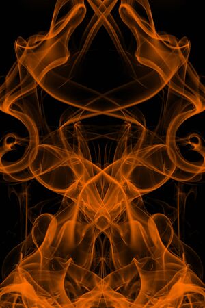 Orange smoke on black background, movement of white smokeの写真素材