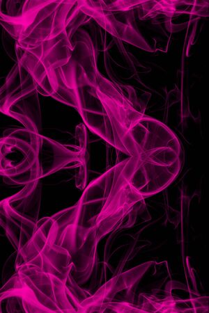 Pink smoke on black background, movement of white smokeの写真素材