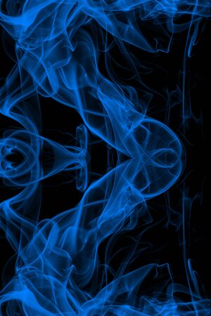 Blue smoke on black background, movement of white smokeの写真素材