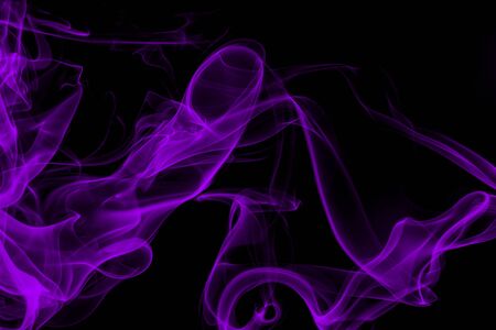 Purple smoke on black background, movement of white smokeの写真素材