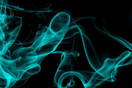 Blue smoke on black background, movement of white smokeの写真素材