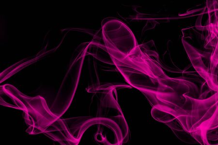 Pink smoke on black background, movement of white smokeの写真素材
