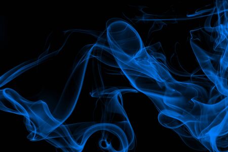 Blue smoke on black background, movement of white smokeの写真素材