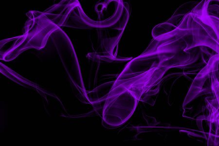 Purple smoke on black background, movement of white smokeの写真素材
