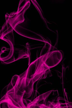 Pink smoke on black background, movement of white smokeの写真素材