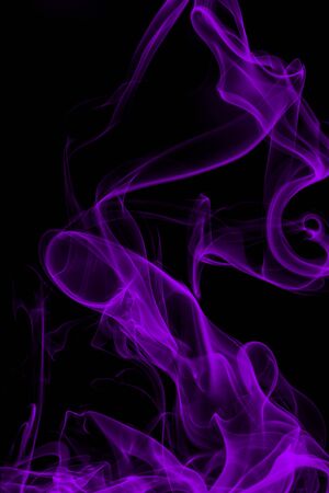 Purple smoke on black background, movement of white smokeの写真素材