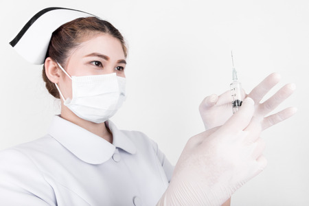 A young attractive asian nurse model is a asian femaleの写真素材