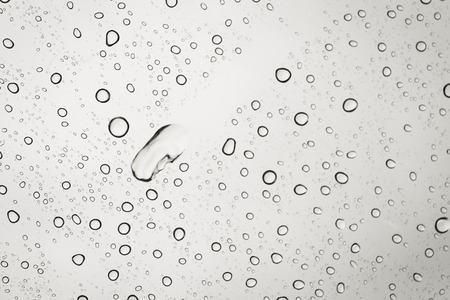 Raindrop on mirror with color filter whiteの写真素材
