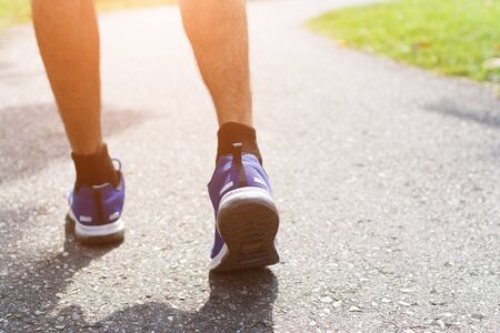 closeup of male running walking shoes. Work out concept, step walk