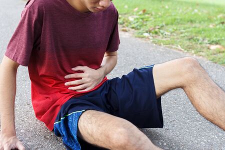 the runner man side cramps after running. workout concept