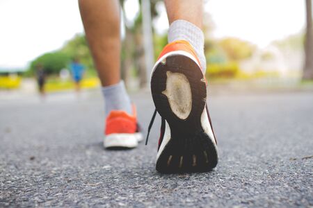 closeup of male running walking shoes. Work out concept, step walk