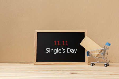 Online shopping  , 11.11 single's day sale concept. The shopping cart and the text 11.11 single's...