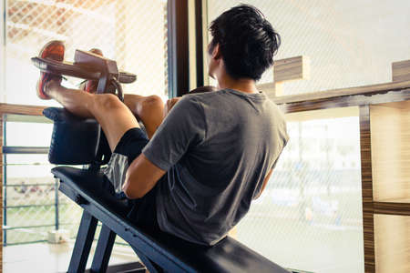 Close up of young asian couple doing sit-ups on gym.Workout concept. Fitness concept.Fitness...