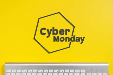 Mock-up online sales day with yellow paper backgroundの写真素材