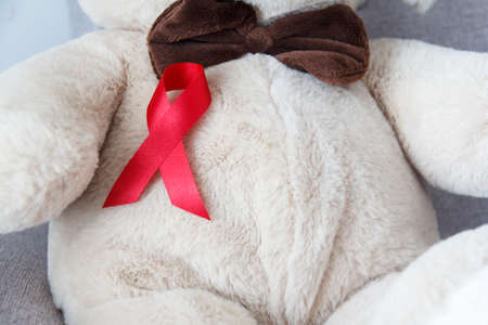 red AIDS awareness ribbon. World aids day and healthcare and medicine conceptの写真素材