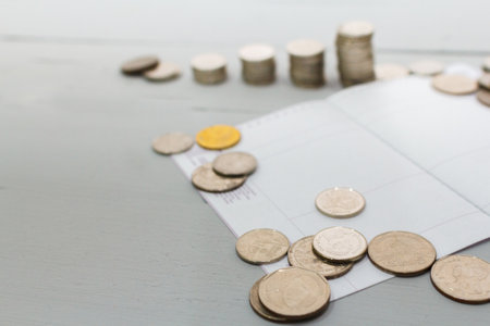 Coin money stack and book bank with space for text