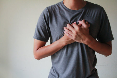 The man suffering from chest pain heart attackの写真素材
