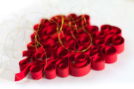 curled red heart made from paperの写真素材