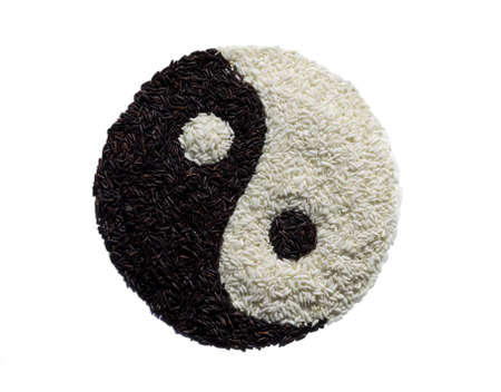 Yin Yang made from black and white riceの写真素材
